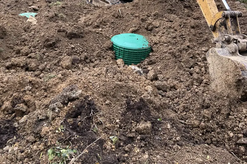 Install dig — green riser and excavator bucket